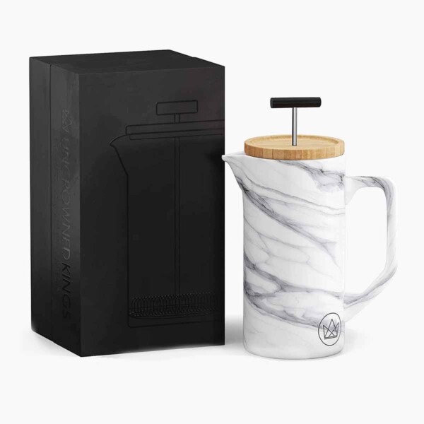 Marble Coffee Press with Bamboo Top next to black box.