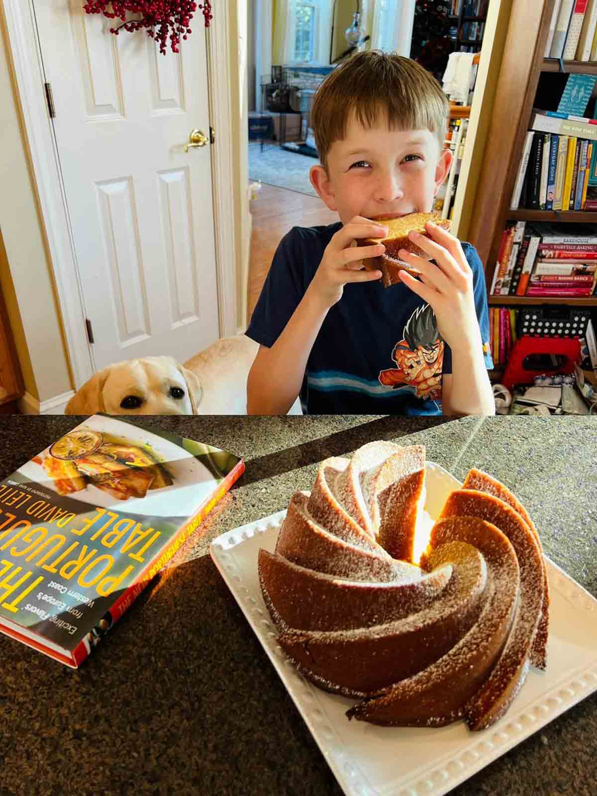 A young boy eating a slice of Portuguese olive oil cake, his dog nearby