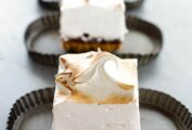Three pieces of Cheryl Day's s'mores bars on individual fluted plates