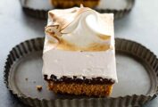 Three pieces of Cheryl Day's s'mores bars on individual fluted plates