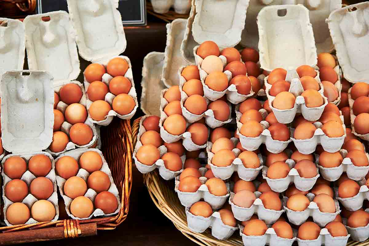 Cartons of fresh eggs at a Paris market