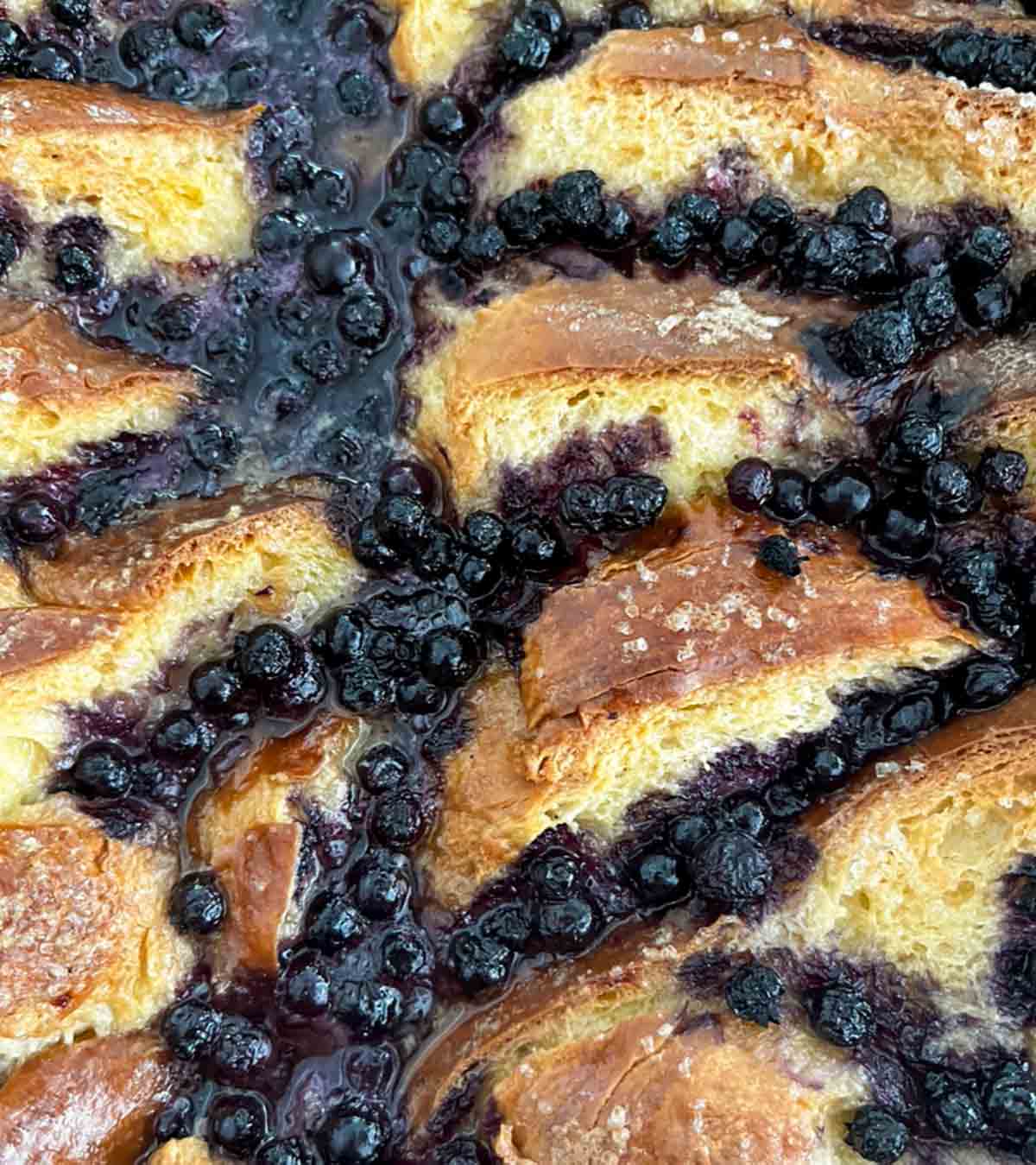 A close-up view of blueberry brioche French toast casserole.