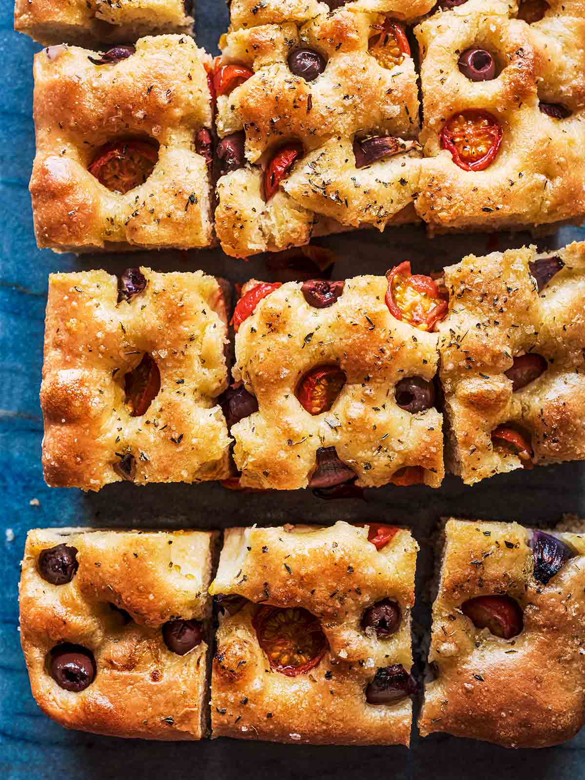 A tomato, olive, and onion focaccia from Paul Hollywood.