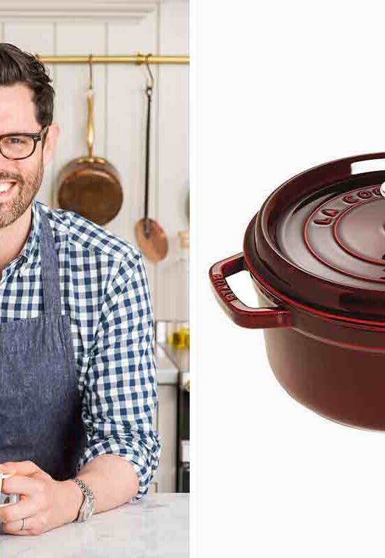 John Kanell on the left leaning against a counter on the left; a Staub Dutch oven on the righ.