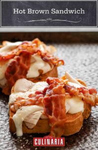 Two open-faced sandwiches topped with turkey, white sauce, and two slices of bacon.