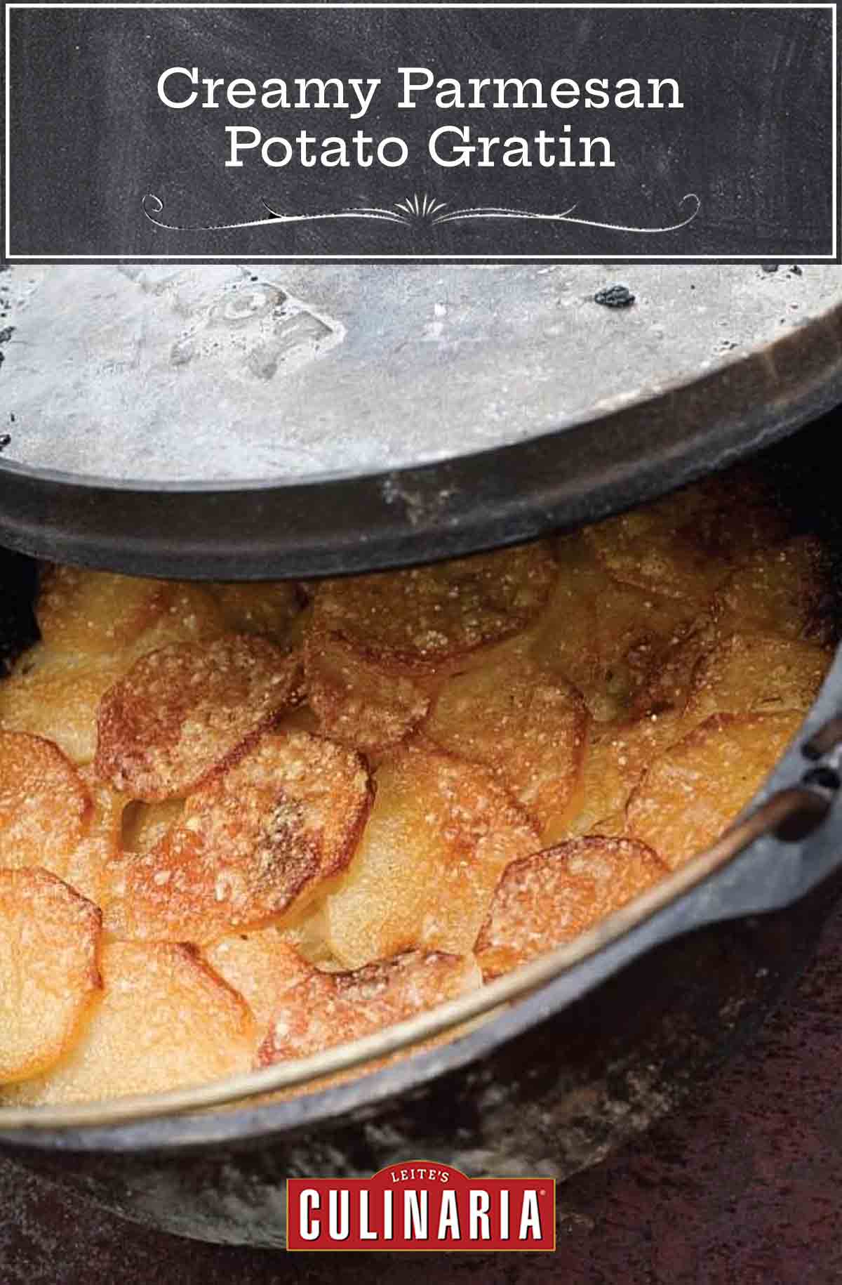 A partially covered Dutch oven filled with cooked Parmesan potato gratin.