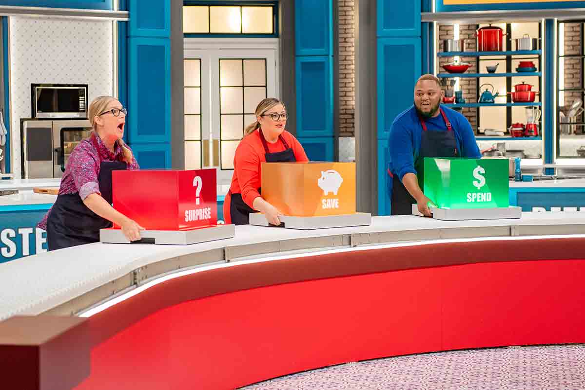 Three contestants on a cooking competition TV show.