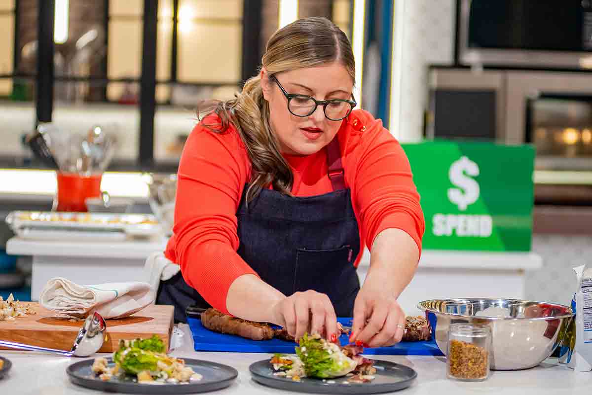 A woman on a cooking competition.
