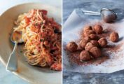 A plate topped with a serving of lobster fra diavolo and 13 chocolate truffles on a sheet of parchment.