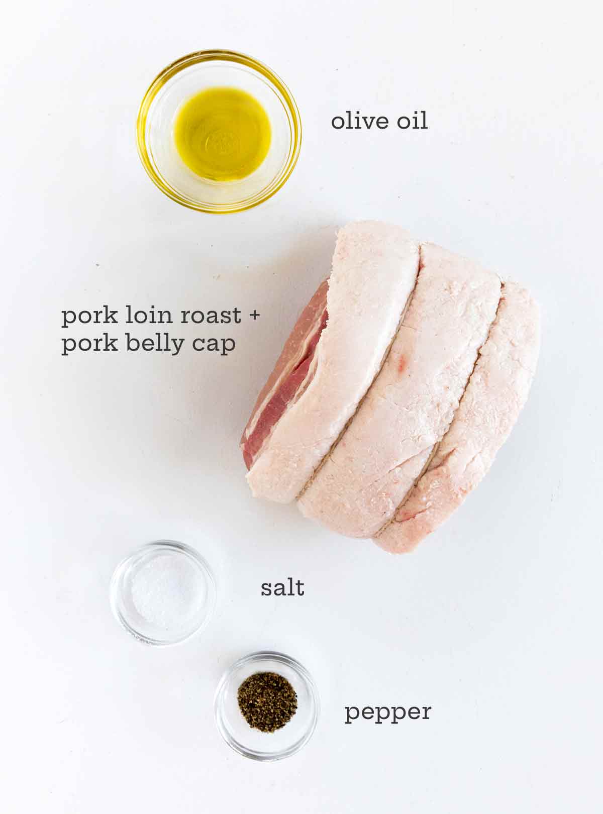 Ingredients for pork loin roast -- pork loin, olive oil, salt, and pepper.
