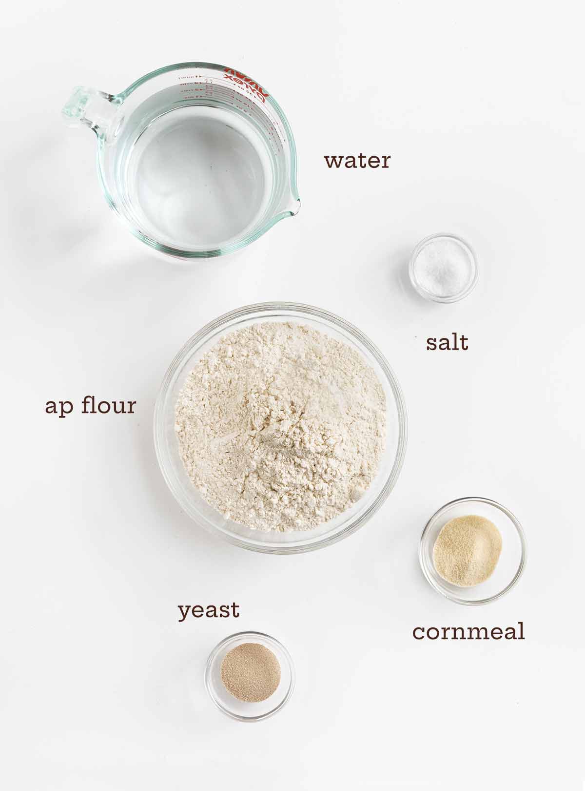 Ingredients for 5-Minutes artisan bread--water, salt, flour, cornmeal, yeast.