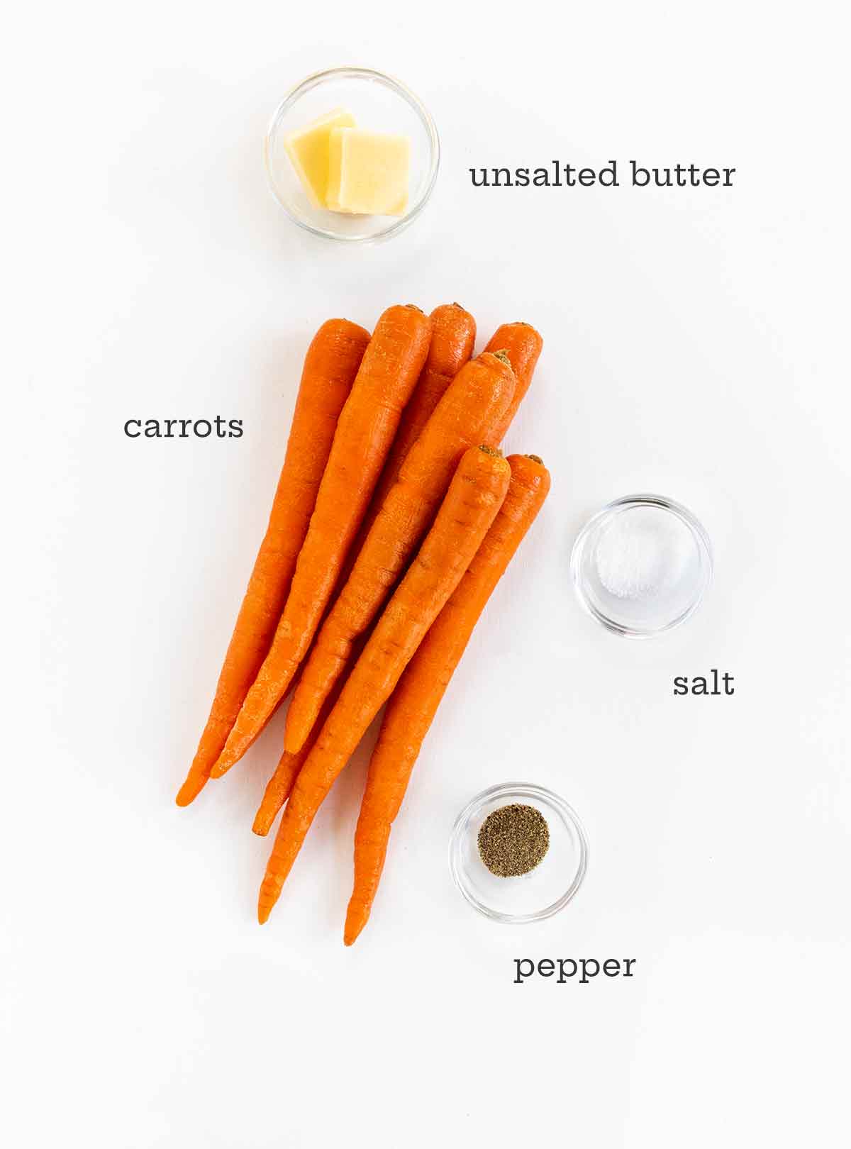 Ingredients for roasted carrots -- carrots, butter, salt, and pepper.