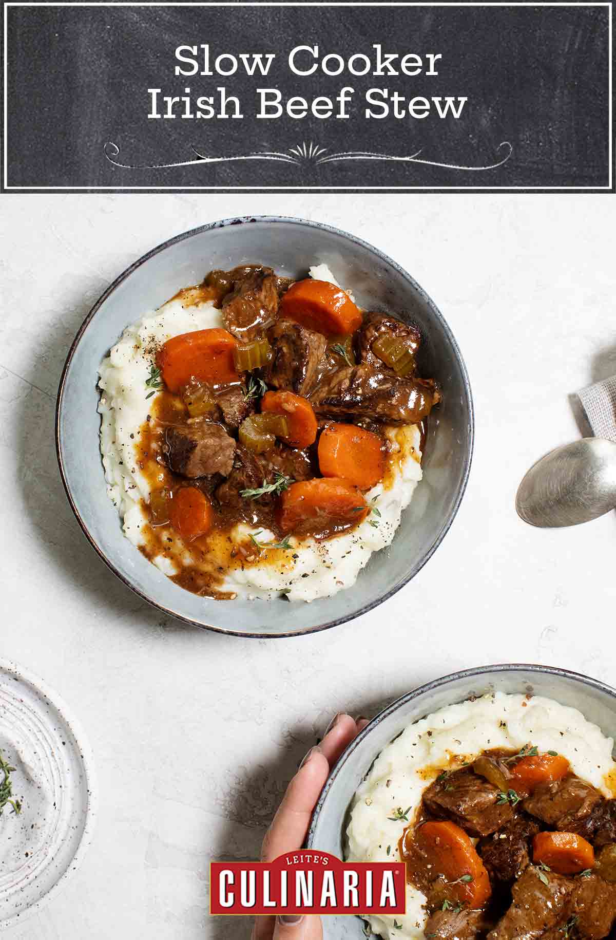 Two bowls filled with mashed potatoes and topped with beef stew.
