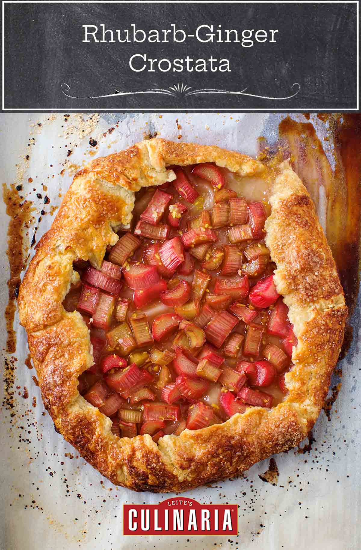 A whole baked rhubarb-ginger crostata on a piece of parchment paper.