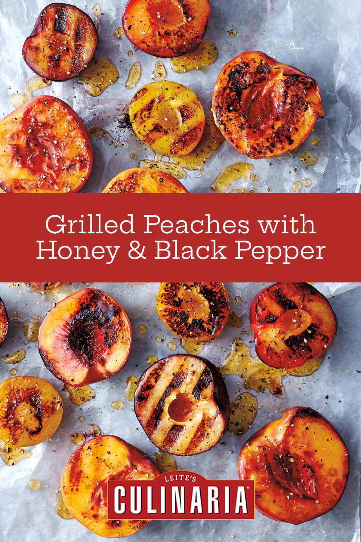 Grilled peaches with honey and black pepper scattered on a piece of parchment paper.