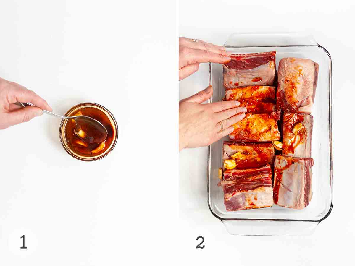 A person mixing up a marinade and spreading it on a baking dish of short ribs.
