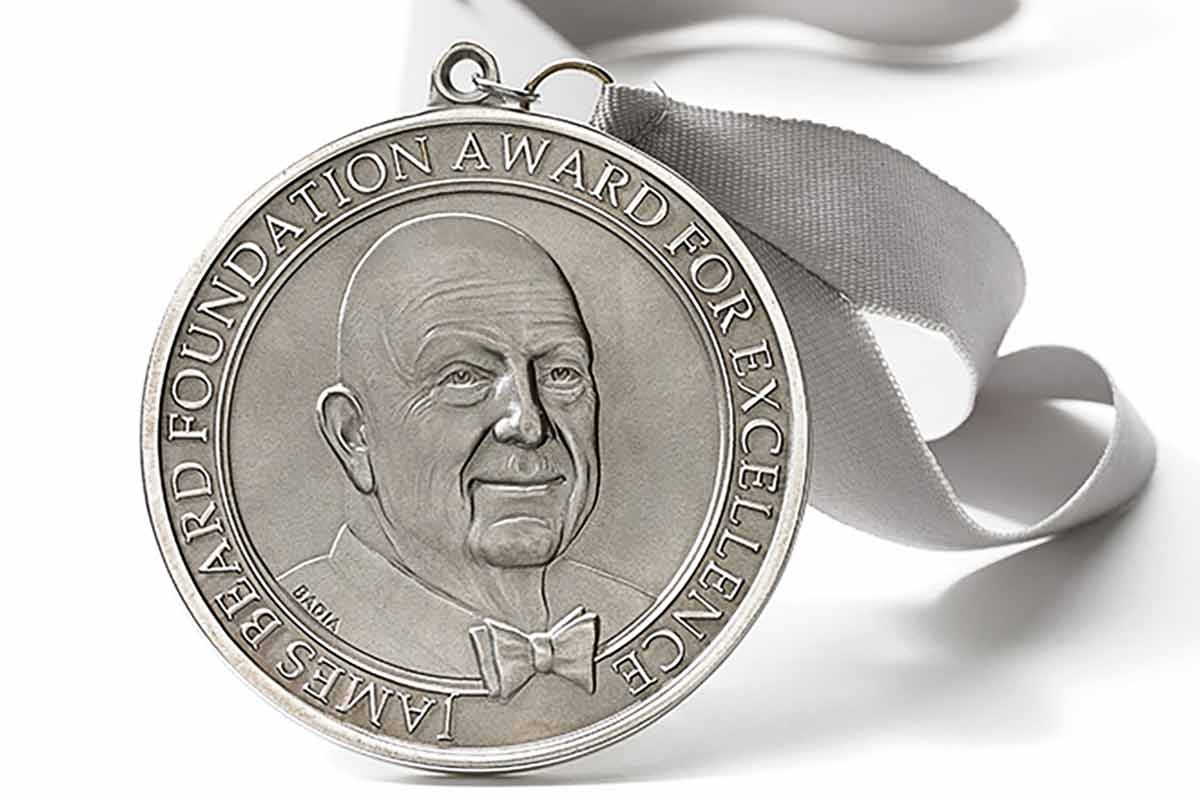 A James Beard Award on a silver ribbon