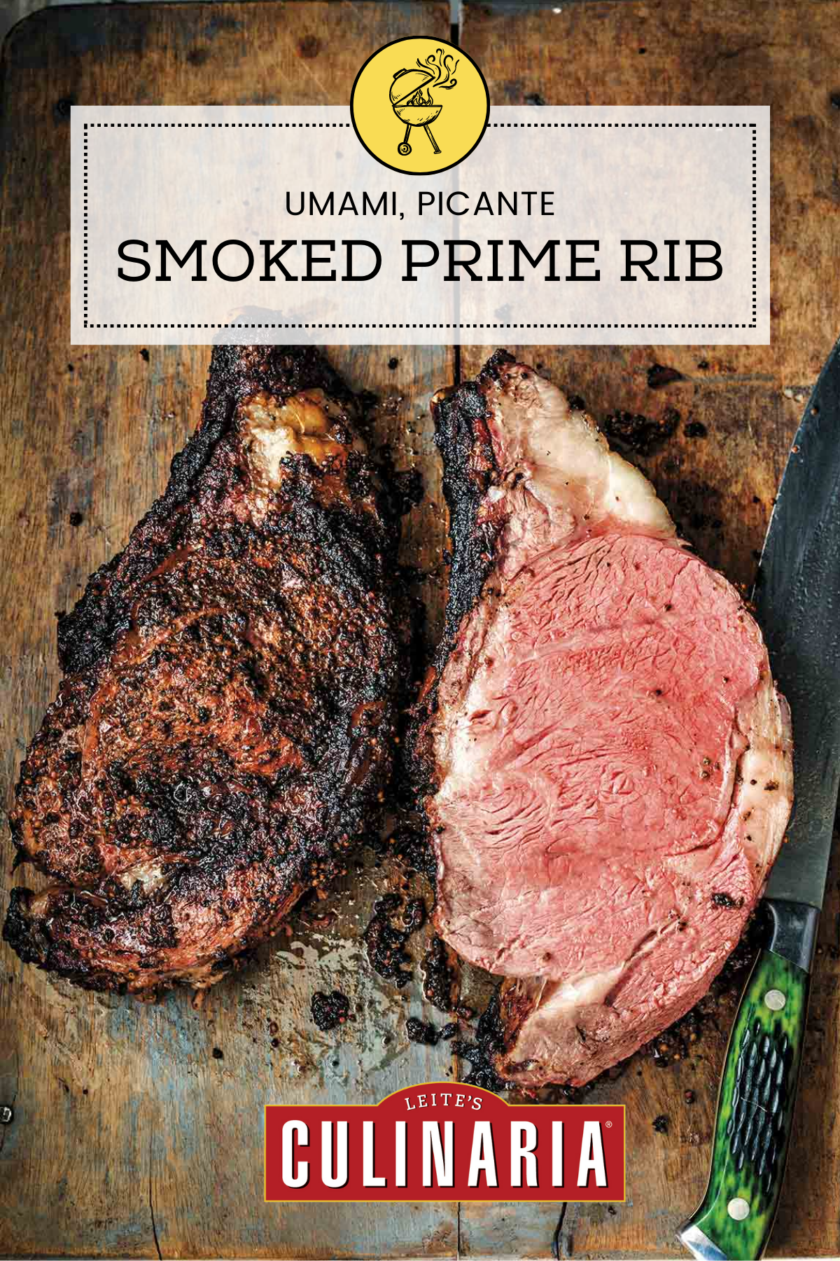A smoked prime rib sliced in half on a wooden board with a green-handled knife beside it.