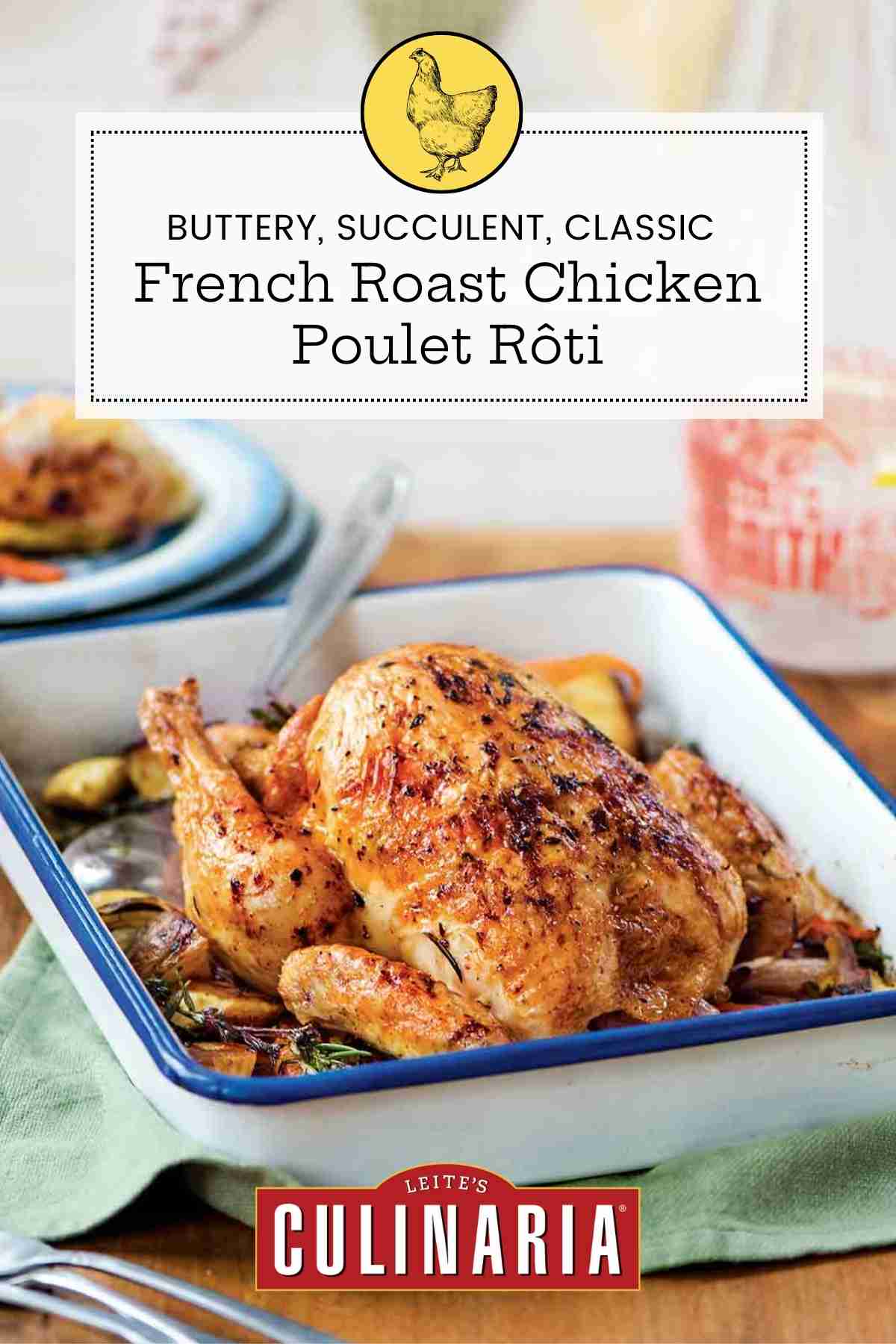 French roast chicken, called poulet rôti in French, in a white pan sitting top of roasted root vegetables.