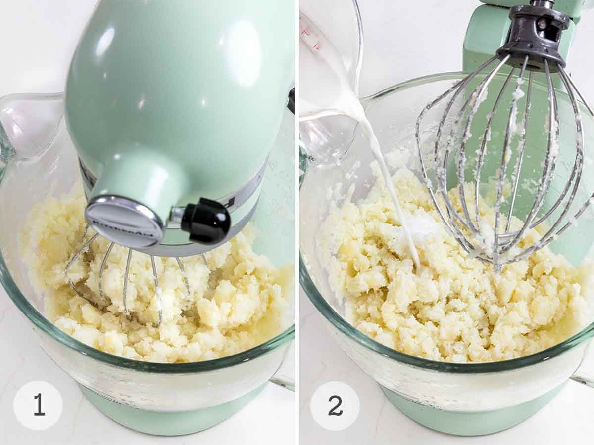 Fluffy mashed potatoes whipped in a stand mixer, then milk being poured into the whipped potato mixture.