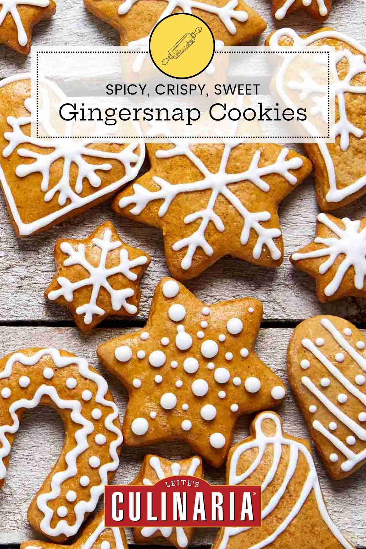 A variety of iced gingersnaps cookies cut into different shapes.