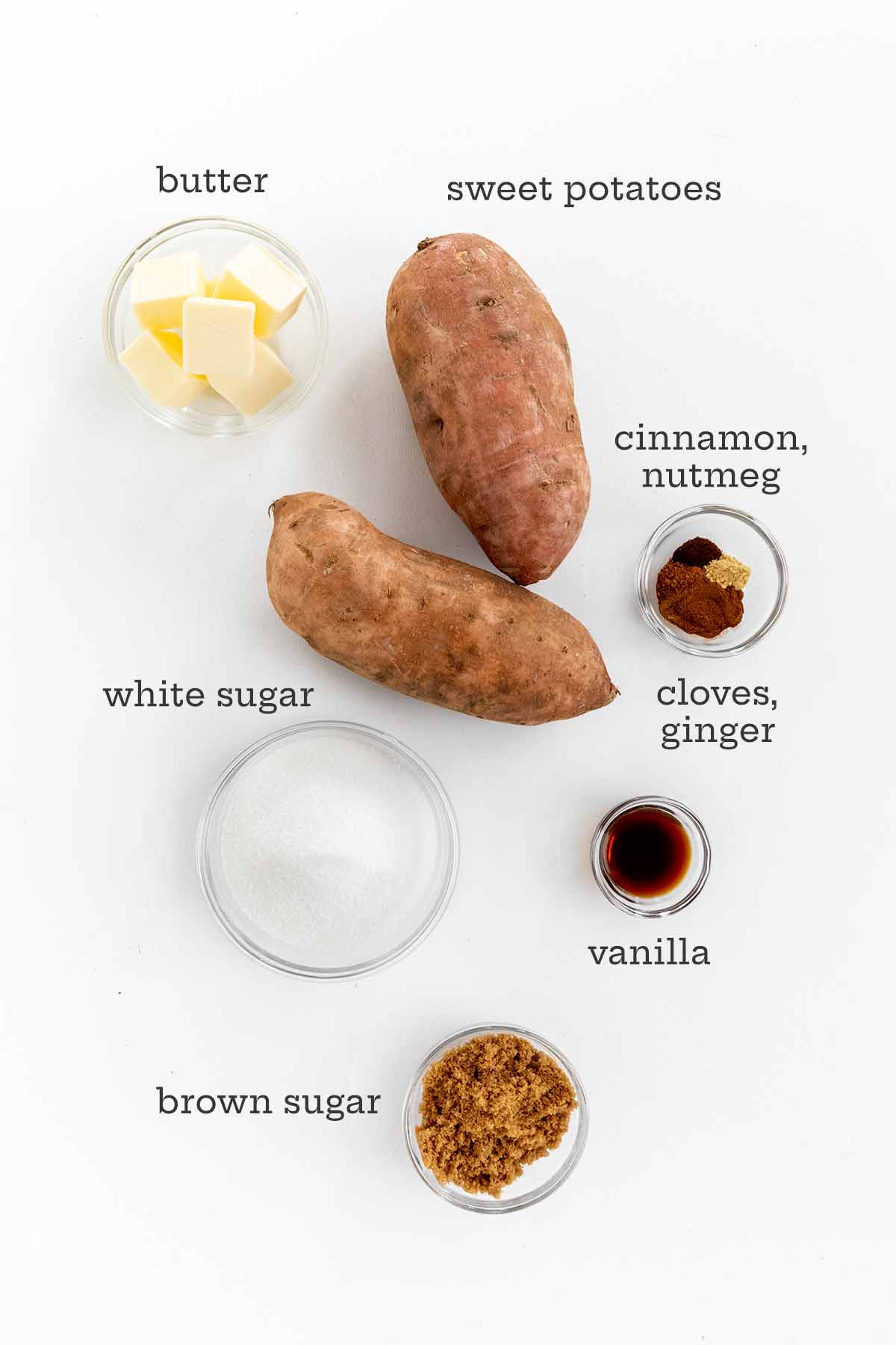 Ingredients for candied sweet potatoes--sweet potatoes, butter, spices, white and brown sugar, and vanilla.