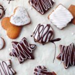 Assorted shaped lebkuchen decorated with white and chocolate icing.
