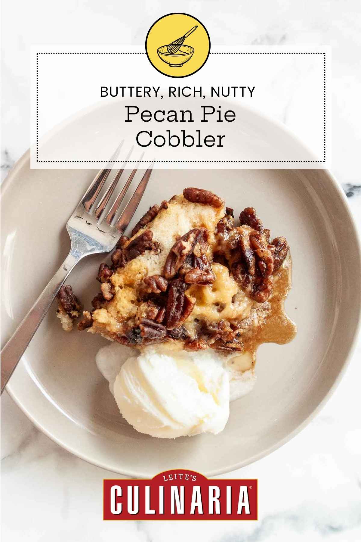 A serving of pecan pie cobbler with a scoop of ice cream and a fork on the side.