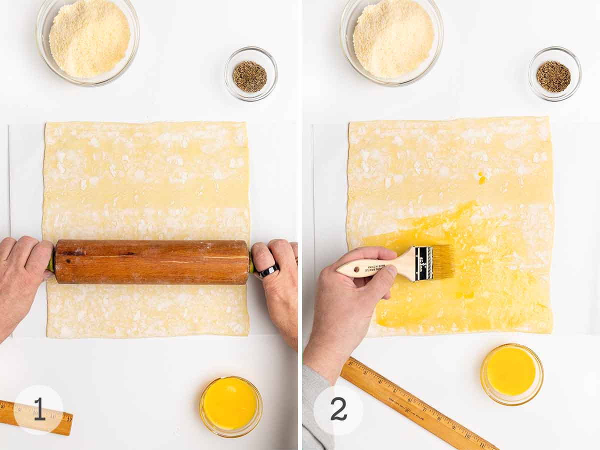 A person rolling out puff pastry and brushing it with egg yolk.