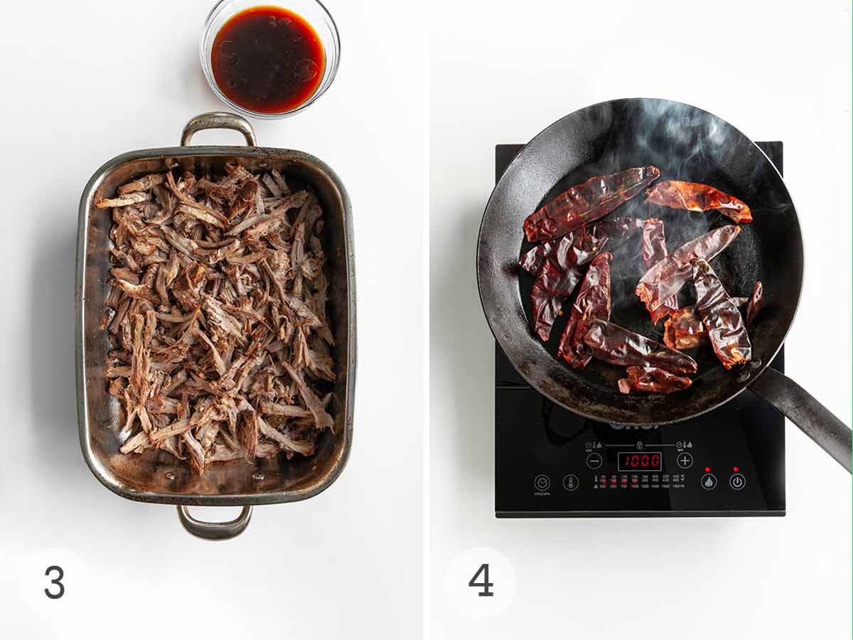 A roasting pan filled with shredded pork and a chiles being toasted in a cast iron skillet.