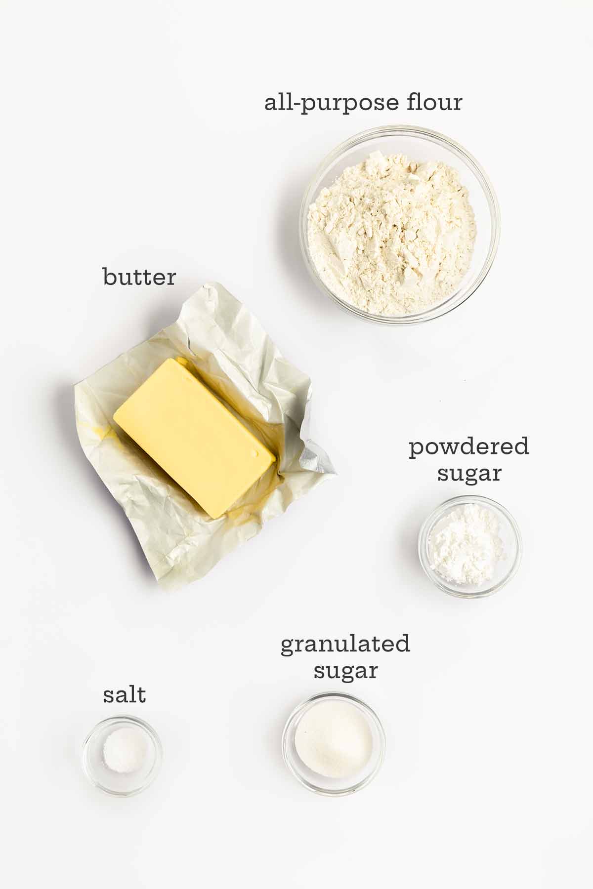 Ingredients for Scottish shortbread--flour, butter, powdered sugar, granulated sugar, and salt.