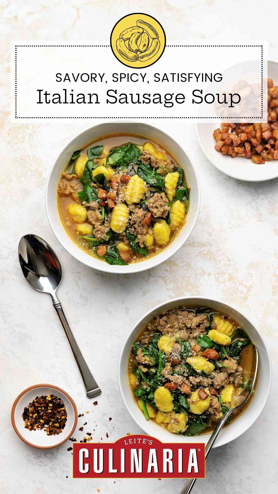 Two bowls of Italian sausage soup with gnocchi and spinach.