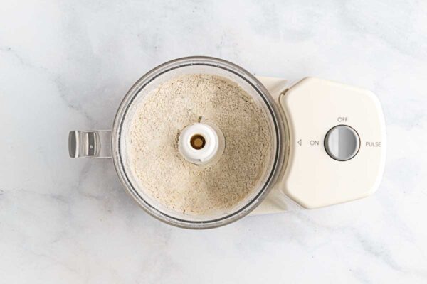 Flour, sugar, and salt in a food processor.