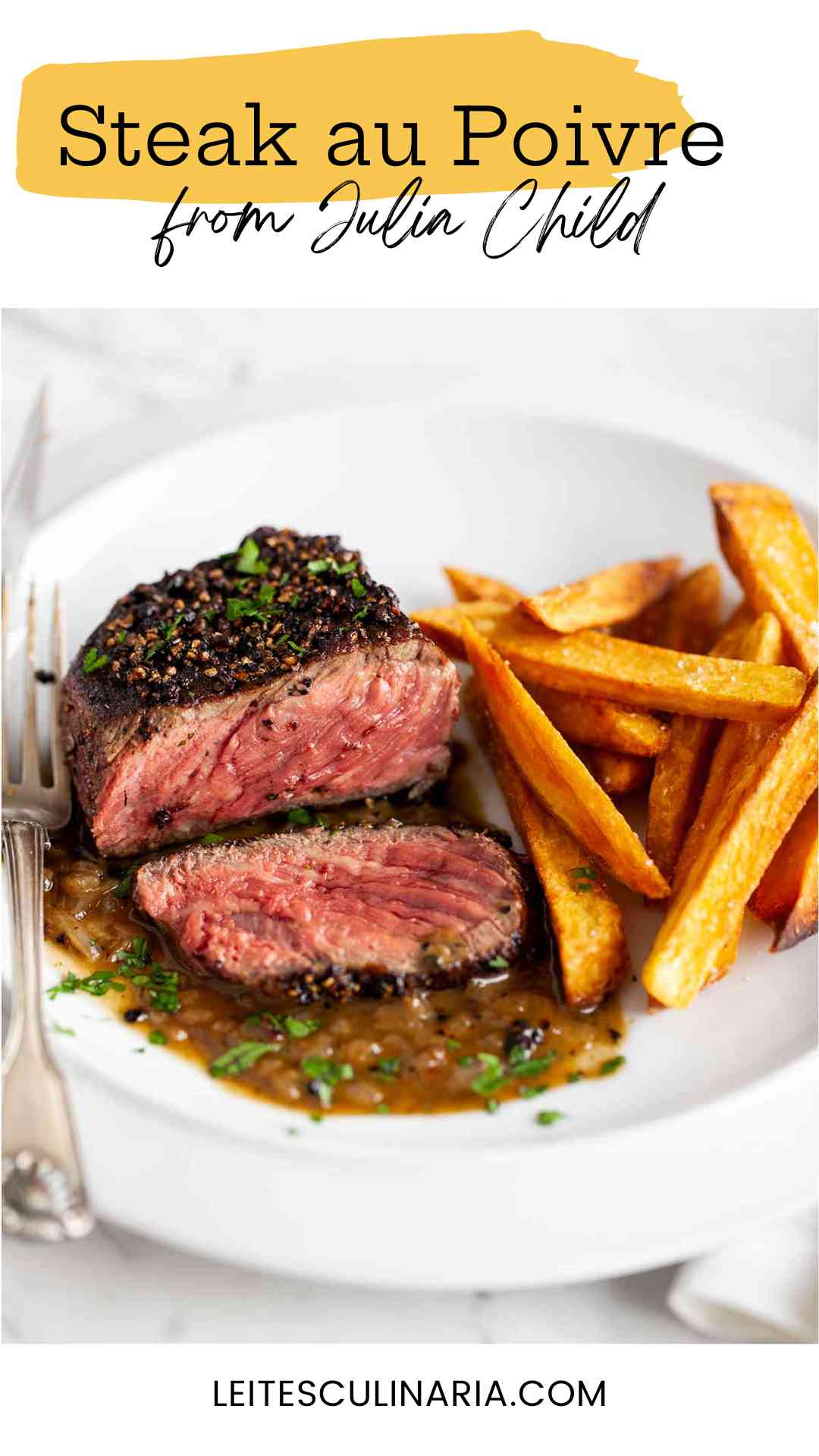 Partially sliced steak au poivre on a white plate with sweet potato fries.