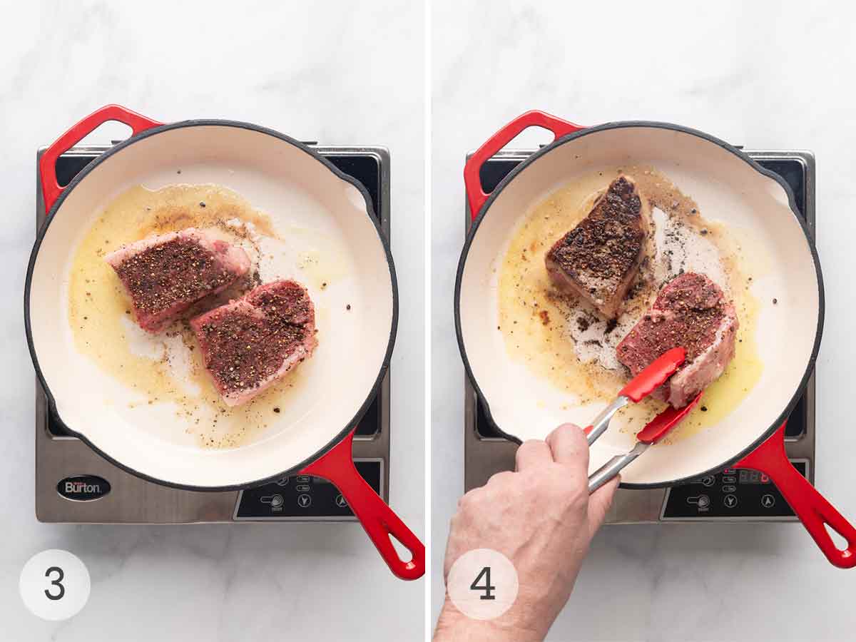 Steak being seared in a cast iron skillet; a person flipping one of the steak pieces.