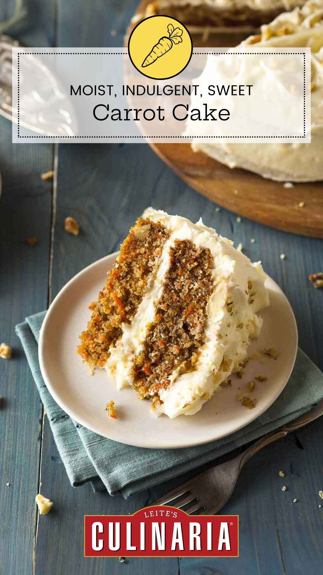 A slice of double-layer carrot cake with cream cheese frosting on a plate with the remaining cake in the background.