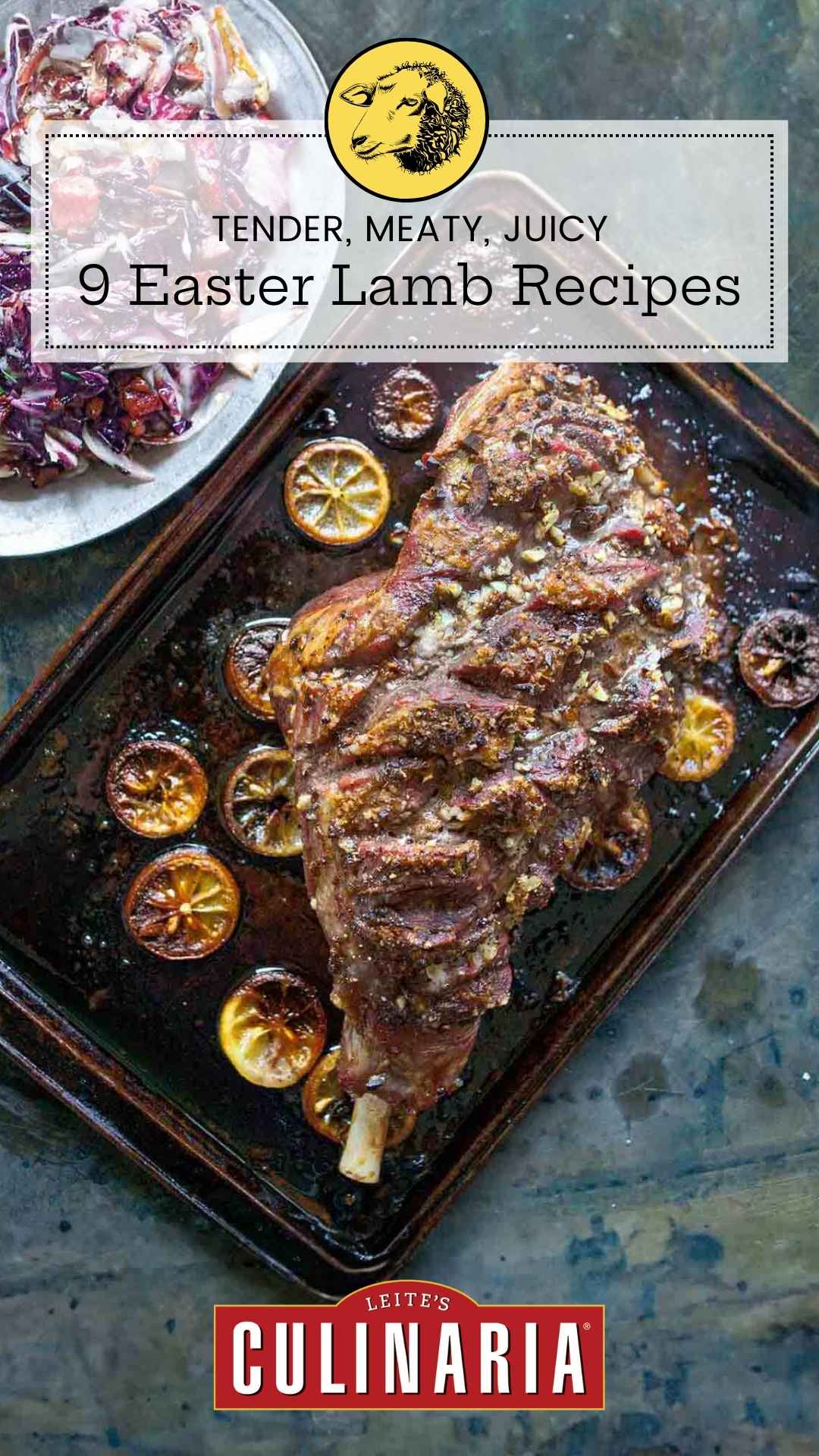 A roast leg of lamb topped with lemon slices on a rimmed baking sheet.