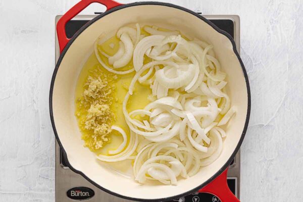 Sliced onions and minced garlic in olive oil in a skillet.