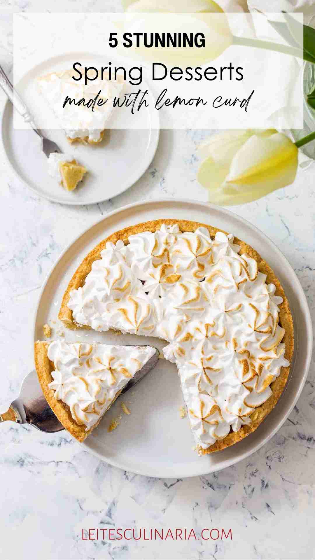 A lemon meringue tart with a slice cut from it on a separate plate.