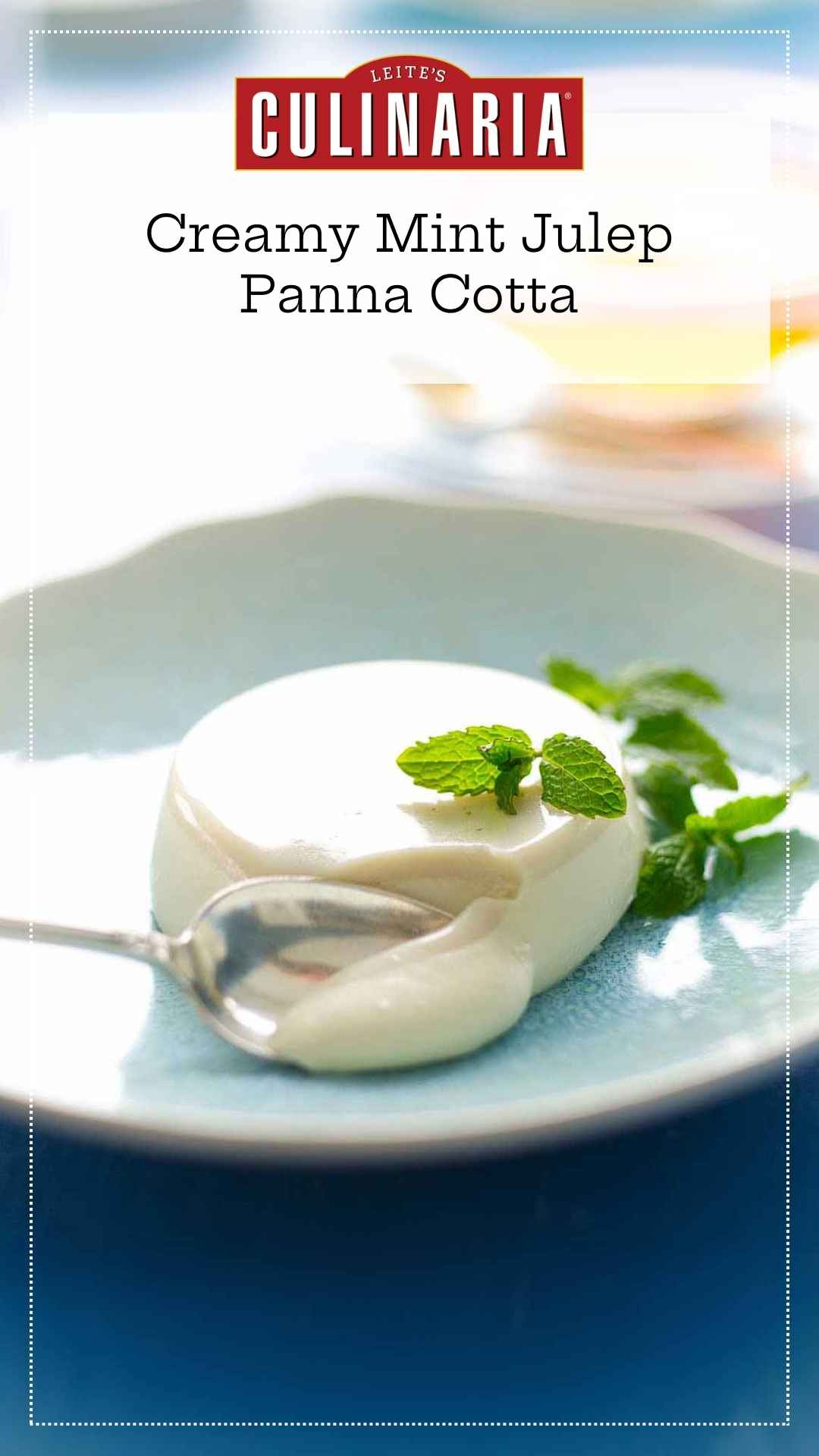 A serving of mint julep panna cotta in a blue bowl, garnished with mint leaves.