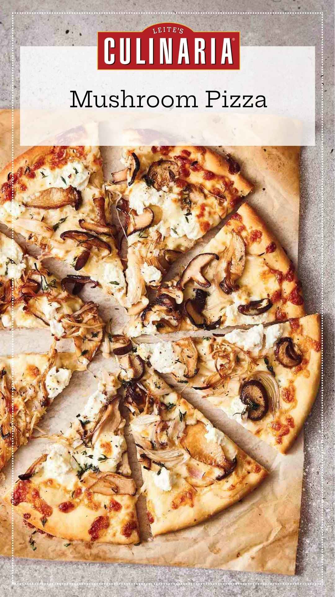 A whole mushroom pizza with ricotta sliced into eight pieces on a sheet of parchment paper.