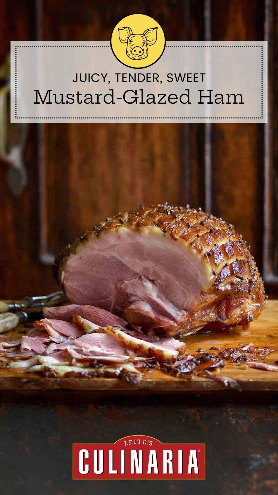 A partially carved mustard-glazed ham, cross-hatched and studded with cloves on a wooden cutting board.