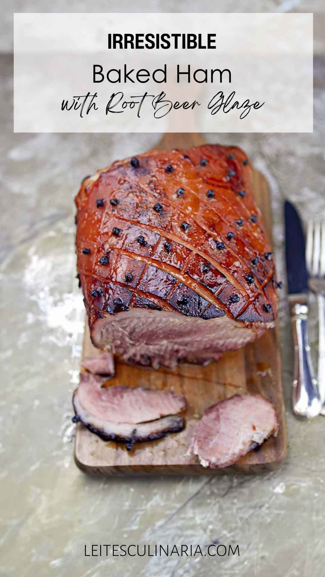 A partially sliced ham, crosshatched and studded with cloves, on a wooden cutting board.