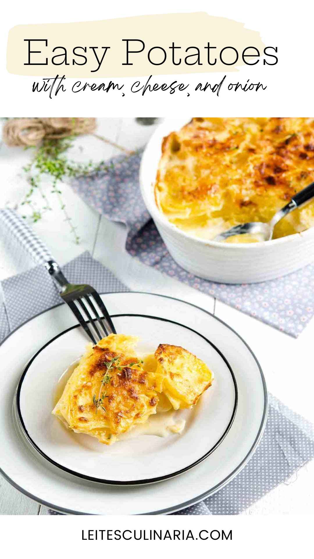 A white plate with a serving of scalloped potatoes topped with a thyme sprig with a casserole dish in the background.