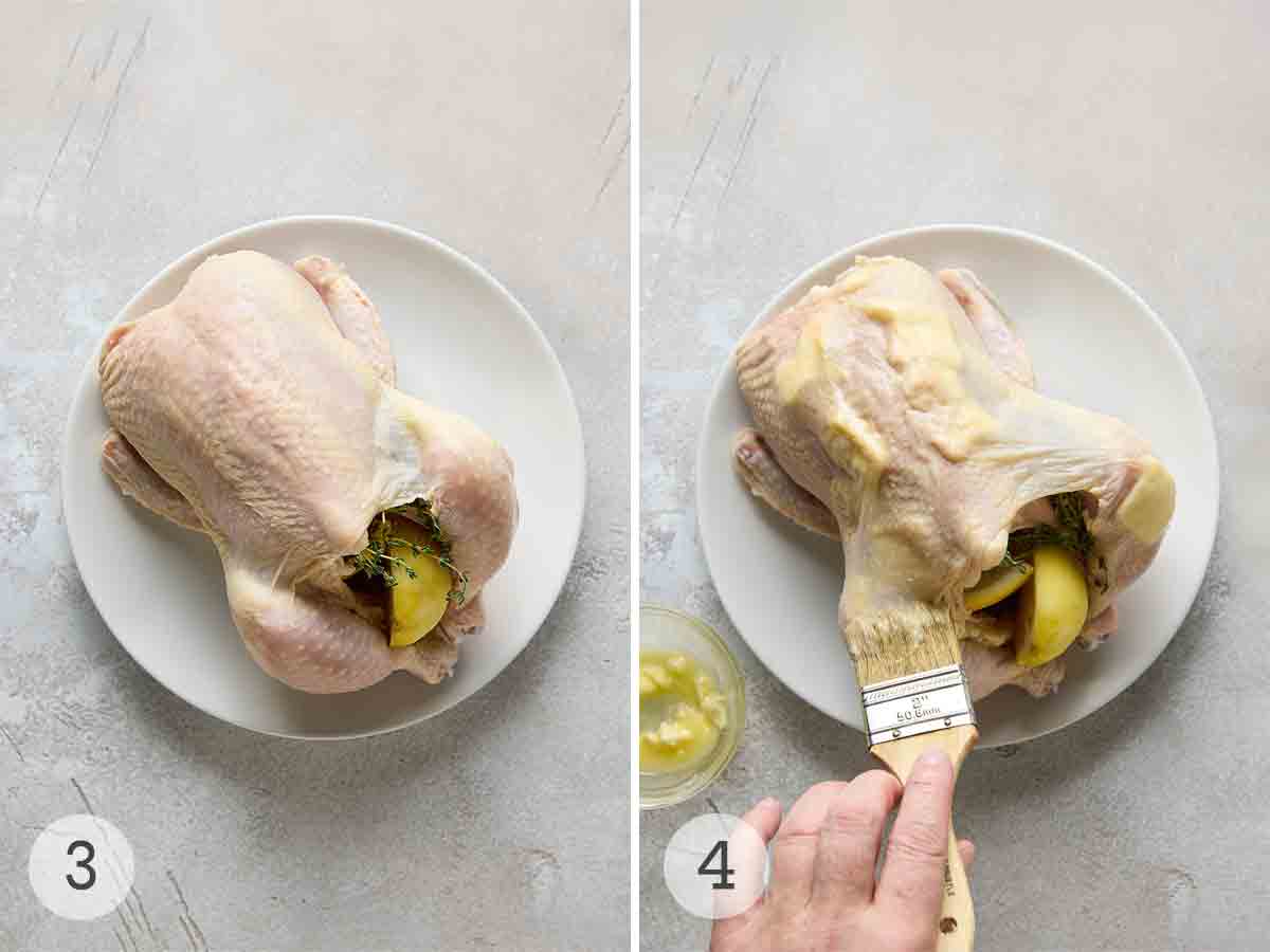 A whole chicken stuffed with lemon and herbs; and person brushing the chicken with garlic butter.
