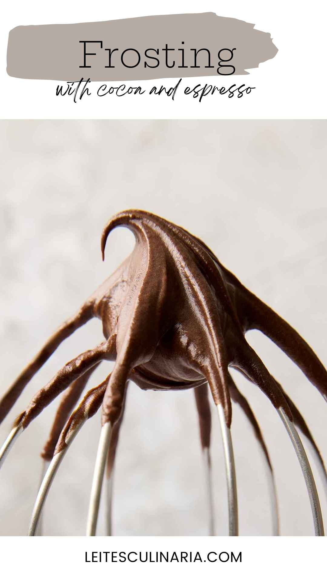 Chocolate frosting on a wire mixer whisk.