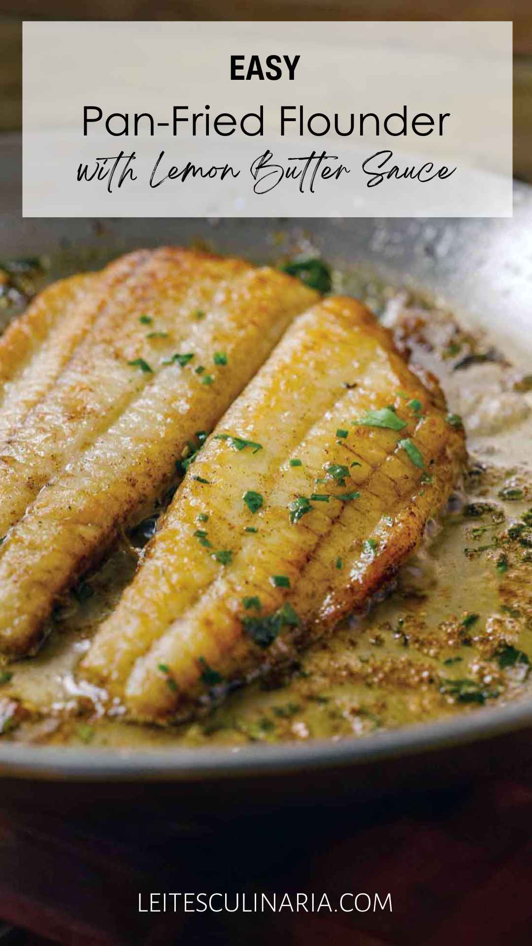 A pan-fried flounder fillet in a skillet with butter and parsley.