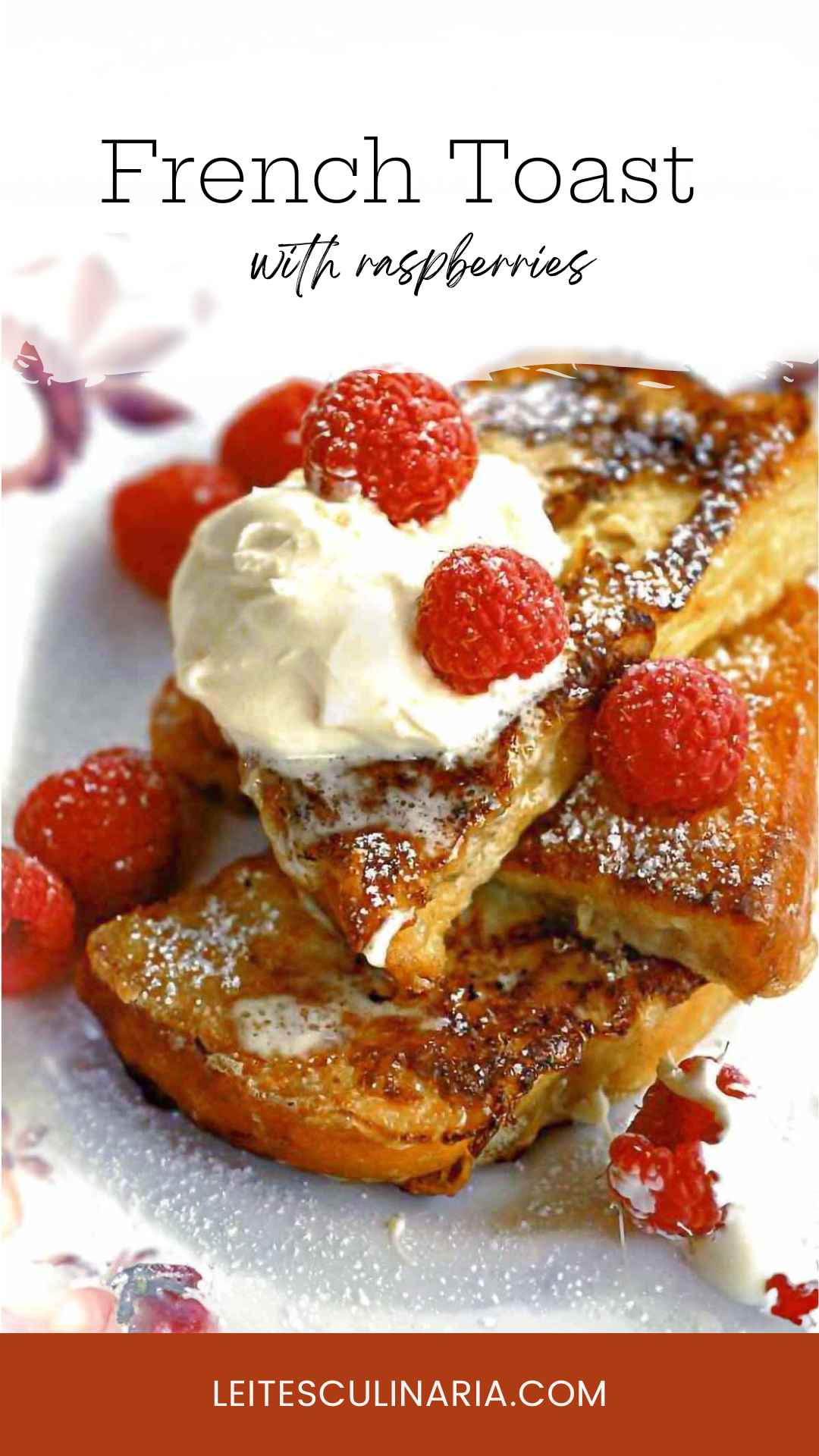 Slices of French toast stacked on a plate, topped with fresh raspberries, crème fraîche, and powdered sugar.