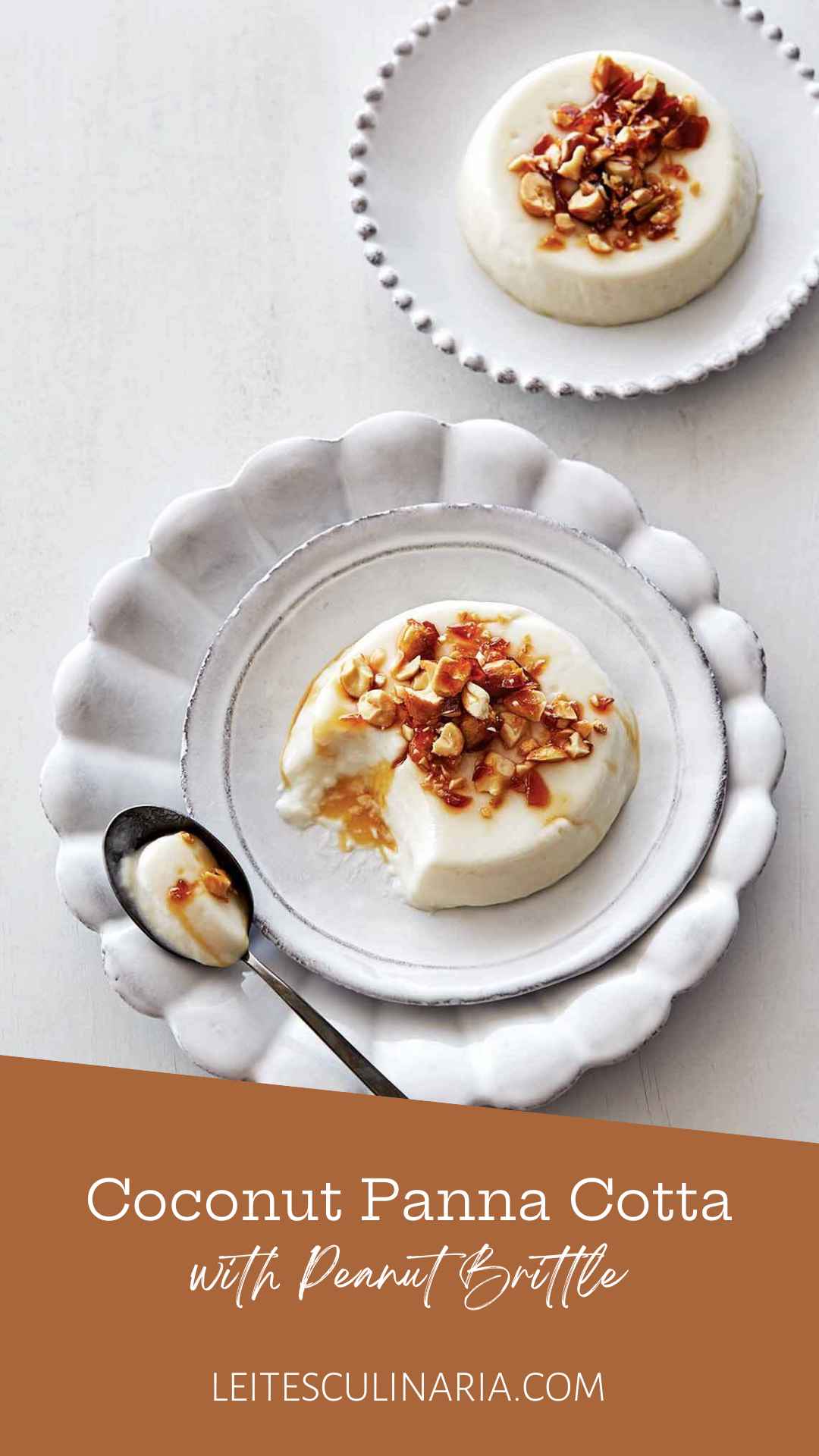 Two servings of coconut panna cotta topped with peanut brittle on decorative white plates.