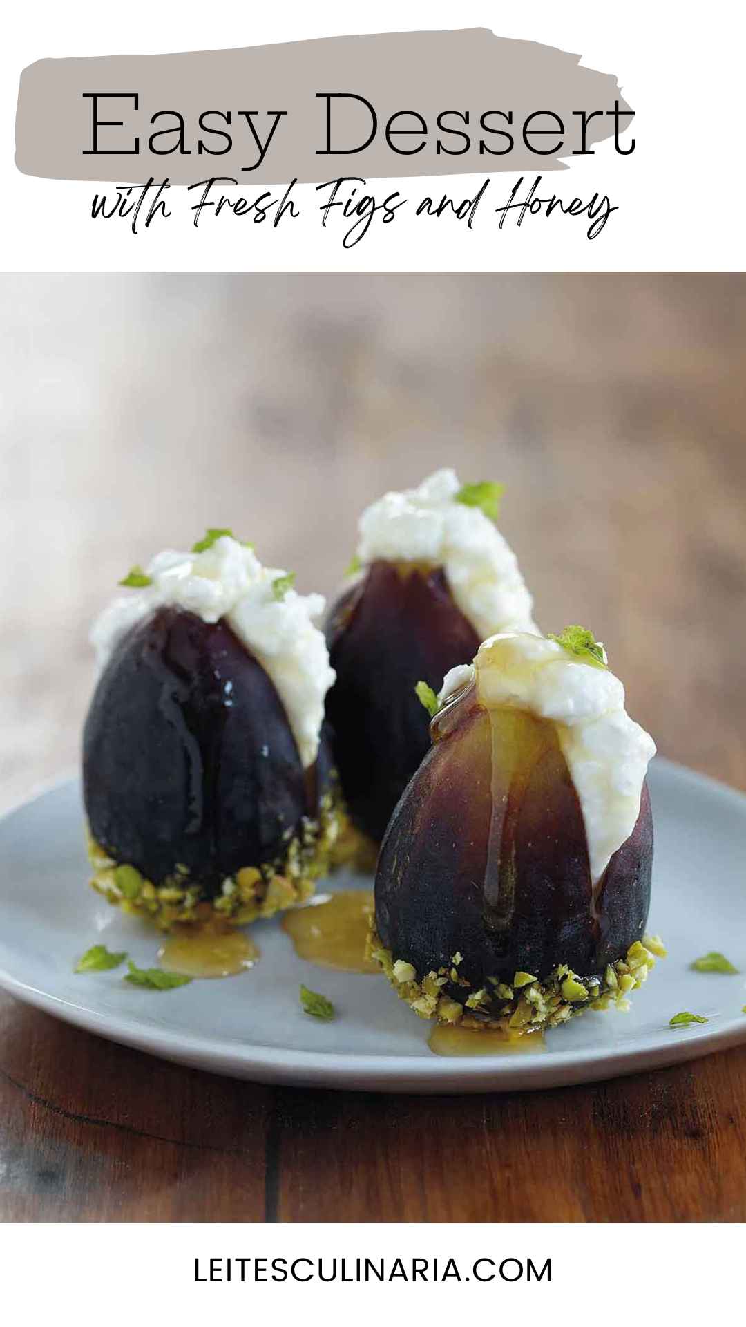 Three figs filled with ricotta cheese and topped with honey on a plate.